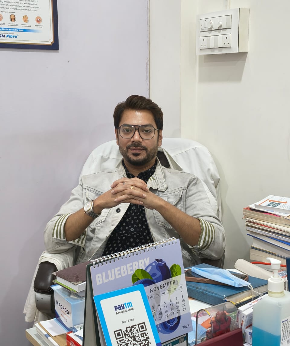 Dr. Souvik Ghosh Dutta in Clinical Consultation Chamber at CosmoDent